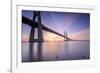 The sun rises on the Vasco da Gama Bridge that spans the Tagus River Lisbon Portugal Europe-ClickAlps-Framed Photographic Print