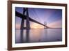 The sun rises on the Vasco da Gama Bridge that spans the Tagus River Lisbon Portugal Europe-ClickAlps-Framed Photographic Print