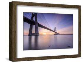 The sun rises on the Vasco da Gama Bridge that spans the Tagus River Lisbon Portugal Europe-ClickAlps-Framed Photographic Print