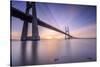 The sun rises on the Vasco da Gama Bridge that spans the Tagus River Lisbon Portugal Europe-ClickAlps-Stretched Canvas