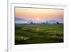 The Sun Sets Behind Foggy Hills and Expansive Rice Paddy Fields Near Chiang Mai, Thailand-Dan Holz-Framed Photographic Print