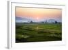 The Sun Sets Behind Foggy Hills and Expansive Rice Paddy Fields Near Chiang Mai, Thailand-Dan Holz-Framed Photographic Print