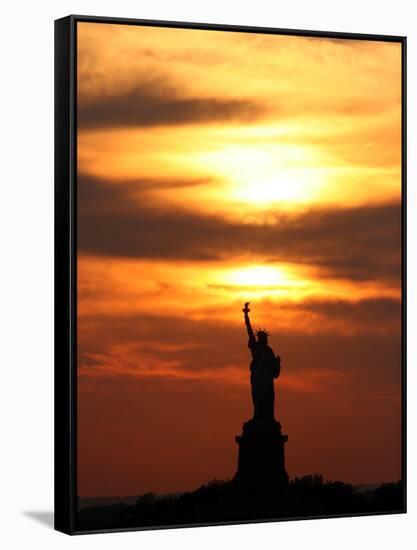 The Sun Sets Behind the Statue of Liberty on the Longest Day of the Year-null-Framed Stretched Canvas