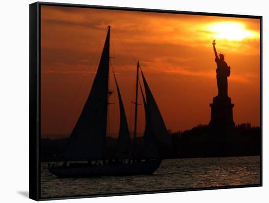 The Sun Sets Behind the Statue of Liberty on the Longest Day of the Year-null-Framed Stretched Canvas