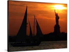 The Sun Sets Behind the Statue of Liberty on the Longest Day of the Year-null-Stretched Canvas