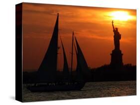 The Sun Sets Behind the Statue of Liberty on the Longest Day of the Year-null-Stretched Canvas