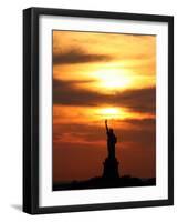 The Sun Sets Behind the Statue of Liberty on the Longest Day of the Year-null-Framed Photographic Print