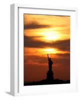 The Sun Sets Behind the Statue of Liberty on the Longest Day of the Year-null-Framed Photographic Print