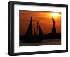 The Sun Sets Behind the Statue of Liberty on the Longest Day of the Year-null-Framed Photographic Print