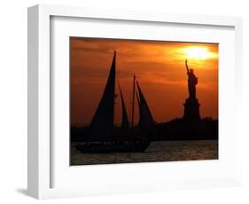 The Sun Sets Behind the Statue of Liberty on the Longest Day of the Year-null-Framed Photographic Print