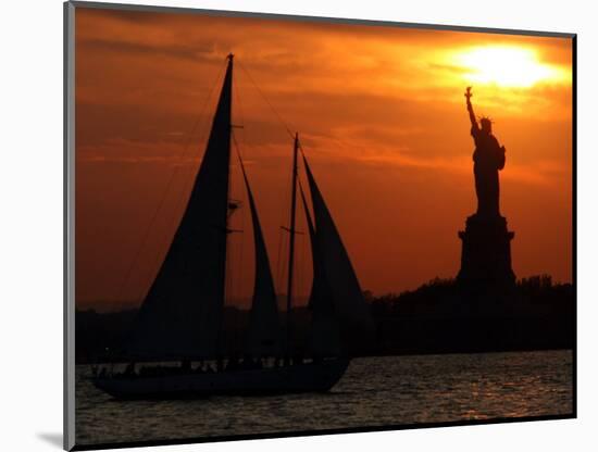 The Sun Sets Behind the Statue of Liberty on the Longest Day of the Year-null-Mounted Photographic Print