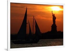 The Sun Sets Behind the Statue of Liberty on the Longest Day of the Year-null-Framed Photographic Print