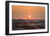 The sun setting over the landscape of hoodoos and hills of Badlands National Park.-Sheila Haddad-Framed Photographic Print