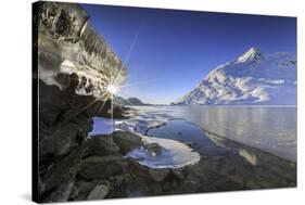 The Sun Shining Through Icicles on the Shores of Lake Bianco, Canton of Graubunden. Engadine-ClickAlps-Stretched Canvas