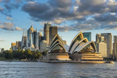 https://imgc.allpostersimages.com/img/posters/the-sydney-opera-house-unesco-world-heritage-site-and-skyline-of-sydney-at-sunset-new-south-wale_u-L-Q1BT1ID0.jpg?artPerspective=n