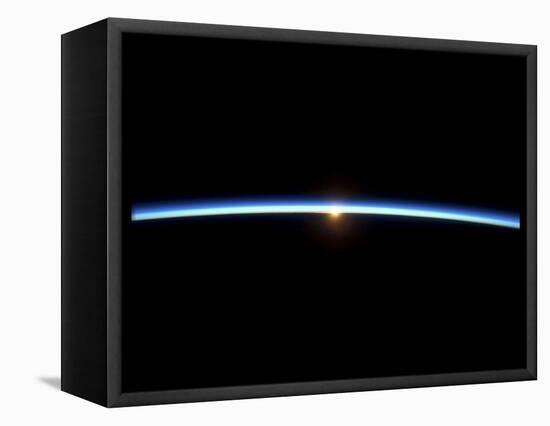 The Thin Line of Earth's Atmosphere and the Setting Sun-null-Framed Stretched Canvas