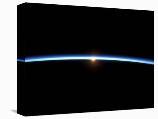 The Thin Line of Earth's Atmosphere and the Setting Sun-null-Stretched Canvas