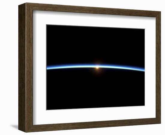 The Thin Line of Earth's Atmosphere and the Setting Sun-null-Framed Photographic Print