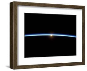 The Thin Line of Earth's Atmosphere and the Setting Sun-null-Framed Photographic Print