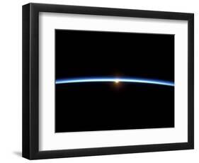 The Thin Line of Earth's Atmosphere and the Setting Sun-null-Framed Photographic Print