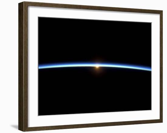 The Thin Line of Earth's Atmosphere and the Setting Sun-null-Framed Photographic Print
