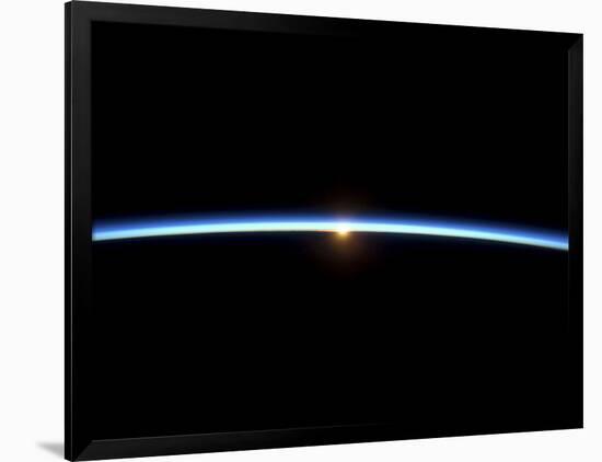 The Thin Line of Earth's Atmosphere and the Setting Sun-null-Framed Photographic Print