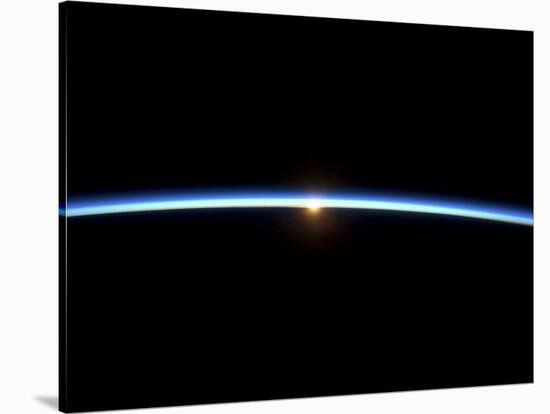 The Thin Line of Earth's Atmosphere and the Setting Sun-null-Stretched Canvas