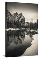 The Three Brothers above the Merced River in winter, Yosemite National Park, California, USA-Russ Bishop-Stretched Canvas