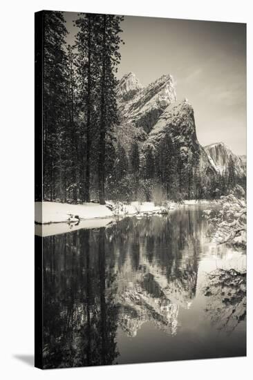 The Three Brothers above the Merced River in winter, Yosemite National Park, California, USA-Russ Bishop-Stretched Canvas