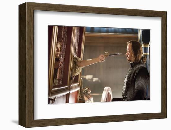 THE THREE MUSKETEERS (L-R) MILLA JOVOVICH and MATTHEW MACFADYEN star in THE THREE MUSKETEERS 3D. (p-null-Framed Photo