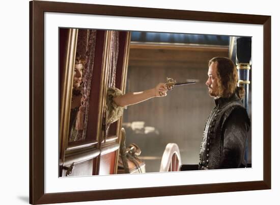 THE THREE MUSKETEERS (L-R) MILLA JOVOVICH and MATTHEW MACFADYEN star in THE THREE MUSKETEERS 3D. (p-null-Framed Photo