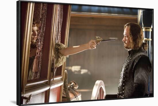 THE THREE MUSKETEERS (L-R) MILLA JOVOVICH and MATTHEW MACFADYEN star in THE THREE MUSKETEERS 3D. (p-null-Framed Photo