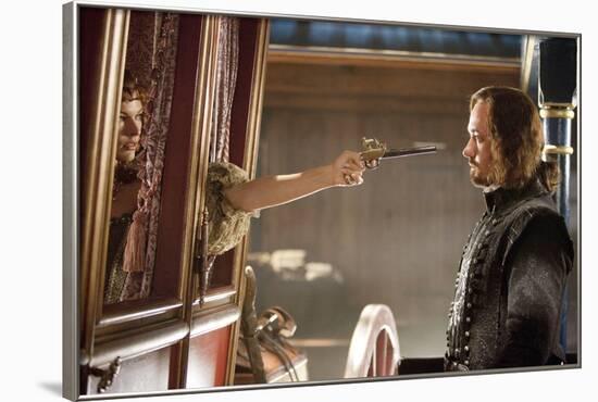 THE THREE MUSKETEERS (L-R) MILLA JOVOVICH and MATTHEW MACFADYEN star in THE THREE MUSKETEERS 3D. (p-null-Framed Photo