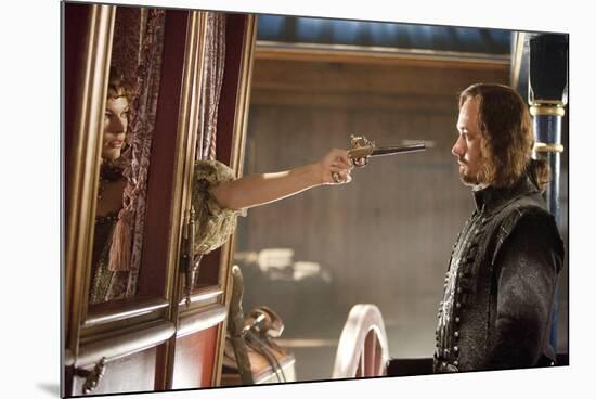 THE THREE MUSKETEERS (L-R) MILLA JOVOVICH and MATTHEW MACFADYEN star in THE THREE MUSKETEERS 3D. (p-null-Mounted Photo