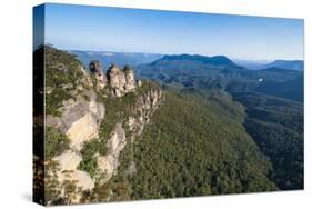 The Three Sisters and Rocky Sandstone Cliffs of the Blue Mountains-Michael Runkel-Stretched Canvas