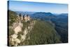 The Three Sisters and Rocky Sandstone Cliffs of the Blue Mountains-Michael Runkel-Stretched Canvas