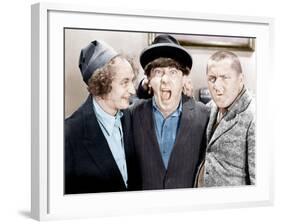 The Three Stooges, from left: Larry Fine, Moe Howard, Curly Howard, ca. 1943-null-Framed Photo