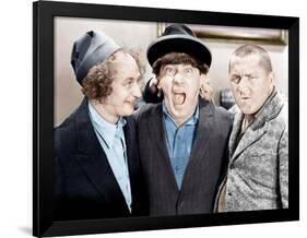 The Three Stooges, from left: Larry Fine, Moe Howard, Curly Howard, ca. 1943-null-Framed Photo