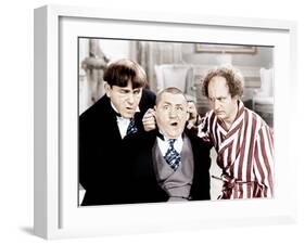 The Three Stooges, from left: Moe Howard, Curly Howard, Larry Fine, ca. 1940s-null-Framed Photo