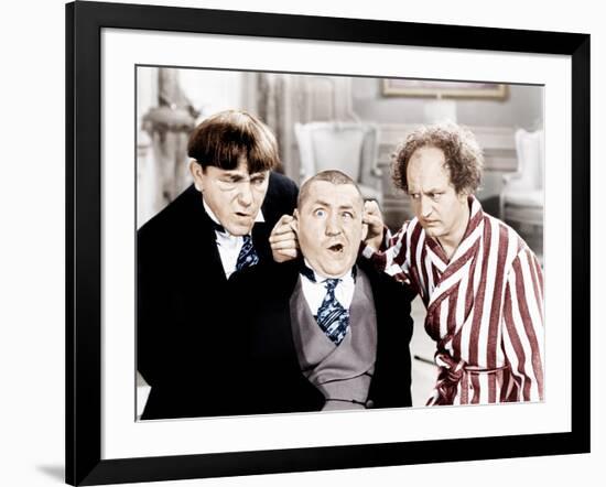 The Three Stooges, from left: Moe Howard, Curly Howard, Larry Fine, ca. 1940s-null-Framed Photo