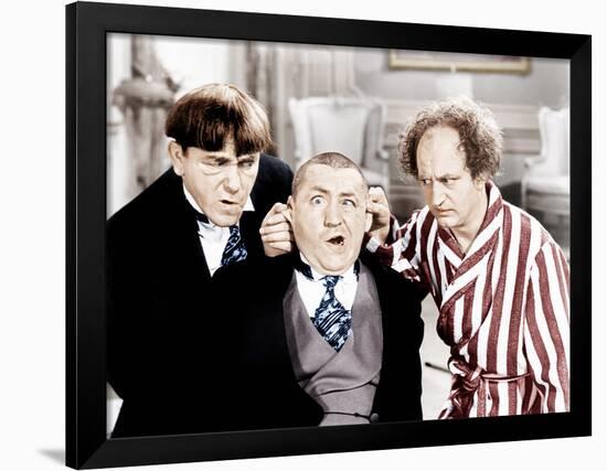 The Three Stooges, from left: Moe Howard, Curly Howard, Larry Fine, ca. 1940s-null-Framed Photo