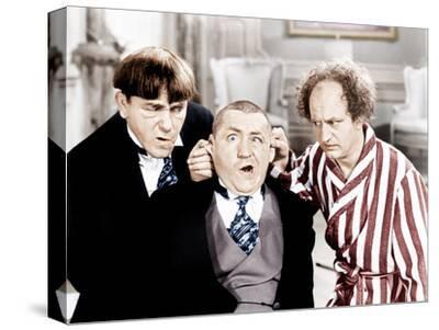'The Three Stooges, from left: Moe Howard, Curly Howard, Larry