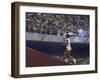 The Torch Being Carried Up the Steps in the Olympic Stadium at the Summer Olympics-John Dominis-Framed Photographic Print