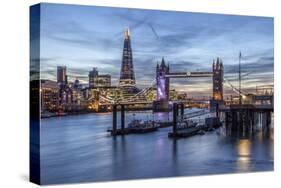 The Tower Bridge in London Seen from the East at Dusk. in the Background-David Bank-Stretched Canvas