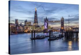 The Tower Bridge in London Seen from the East at Dusk. in the Background-David Bank-Stretched Canvas