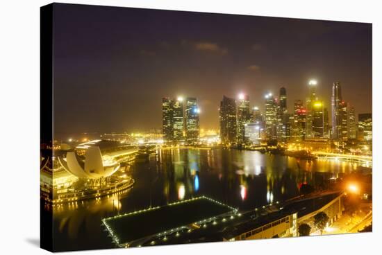 The Towers of the Central Business District and Marina Bay by Night, Singapore, Southeast Asia-Fraser Hall-Stretched Canvas