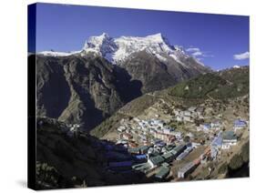 The Town of Namche Bazaar with the Kongde Ri (Kwangde Ri) Mountain Range in the Background-John Woodworth-Stretched Canvas