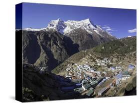 The Town of Namche Bazaar with the Kongde Ri (Kwangde Ri) Mountain Range in the Background-John Woodworth-Stretched Canvas