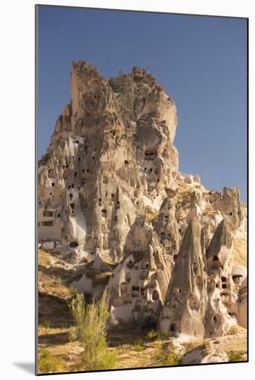 The Town of Orchisar, Showing the Old Tunneled Houses Dug into the Volcanic Rock, Cappadocia-David Clapp-Mounted Photographic Print