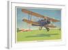 The Travel-Air Biplane-null-Framed Art Print